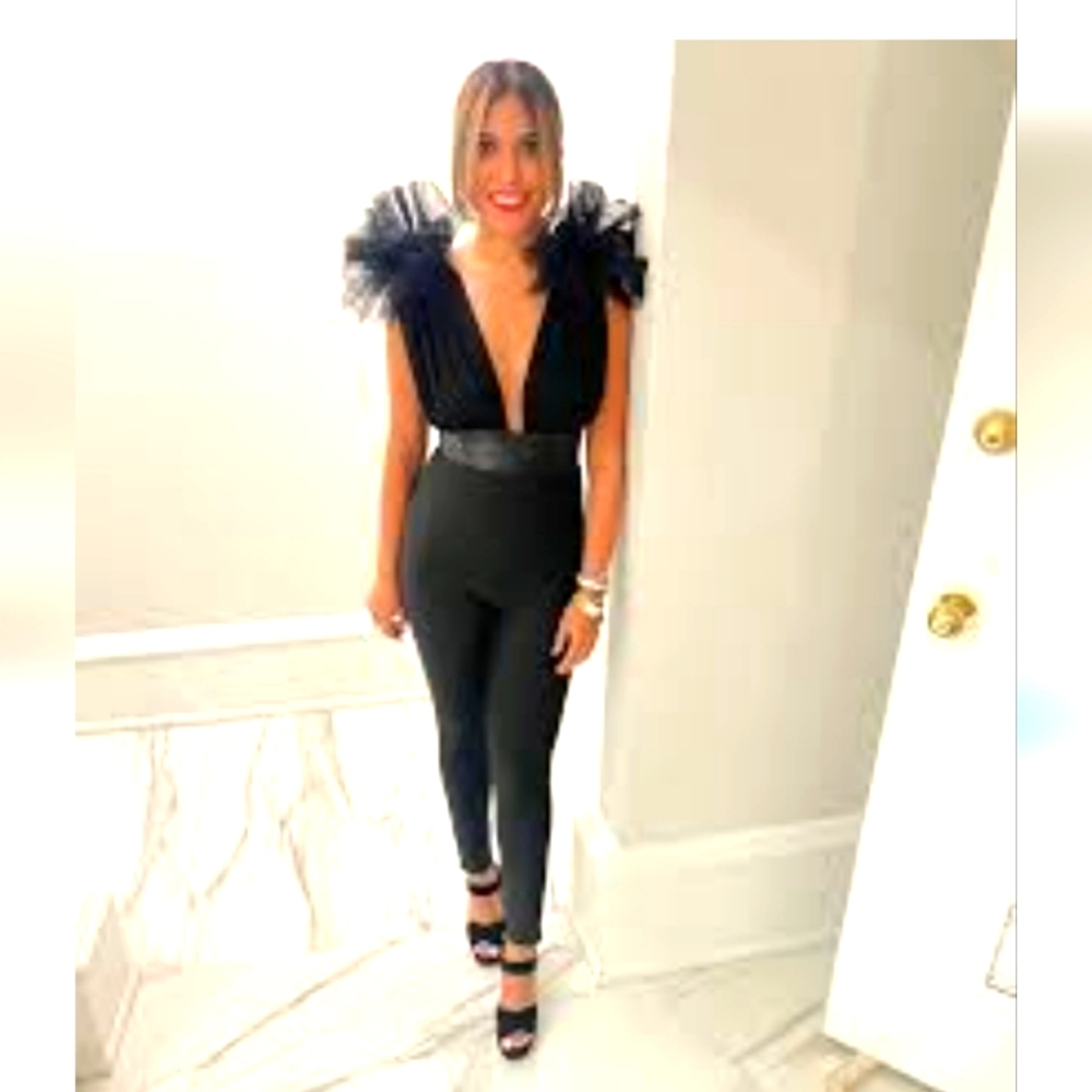 Fashionnova lrg black jumpsuit. WORN ONCE